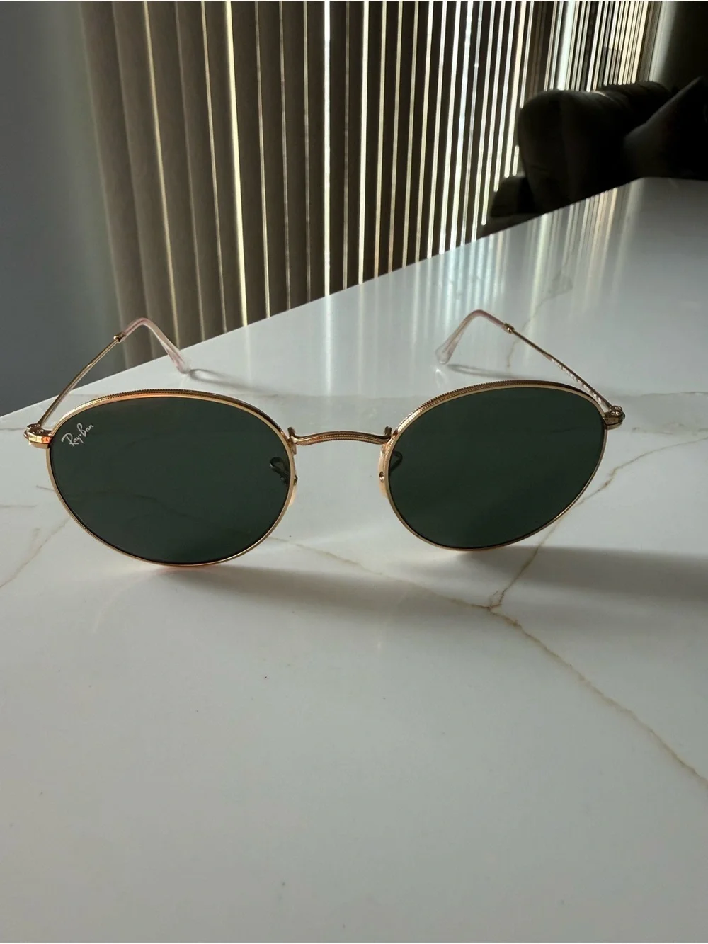 Ray-Ban Round Metal Sunglasses in Gold with Dark Lenses